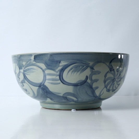 Bol bleu et blanc avec motif floral, env. 16 cm de diamètre.