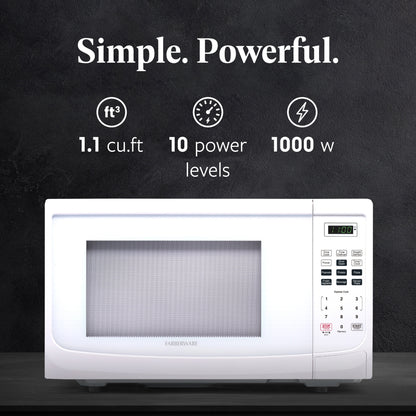 Four à micro-ondes de comptoir Farberware de 1000 watts et 1,1 pi³ avec éclairage LED et verrouillage enfant.