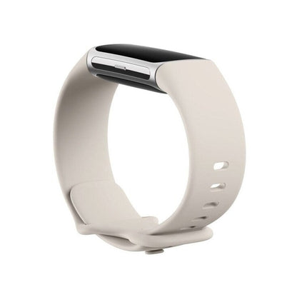 Fitbit Charge 6, tracker d'activité physique, finition en porcelaine et aluminium argenté.