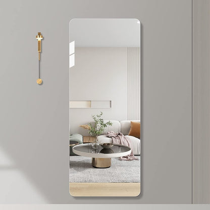 Grand miroir de corps sans cadre, à fixer au mur.