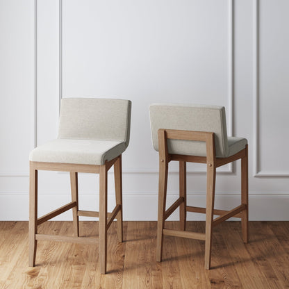 Tabouret de bar moderne Gracie, chaise rembourrée en bouclette et pieds en bois brossé